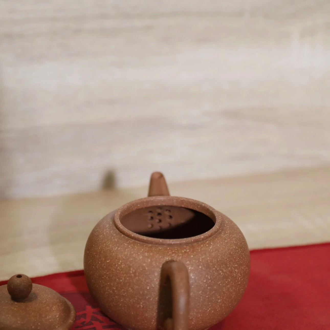 Horizontal purple clay teapot