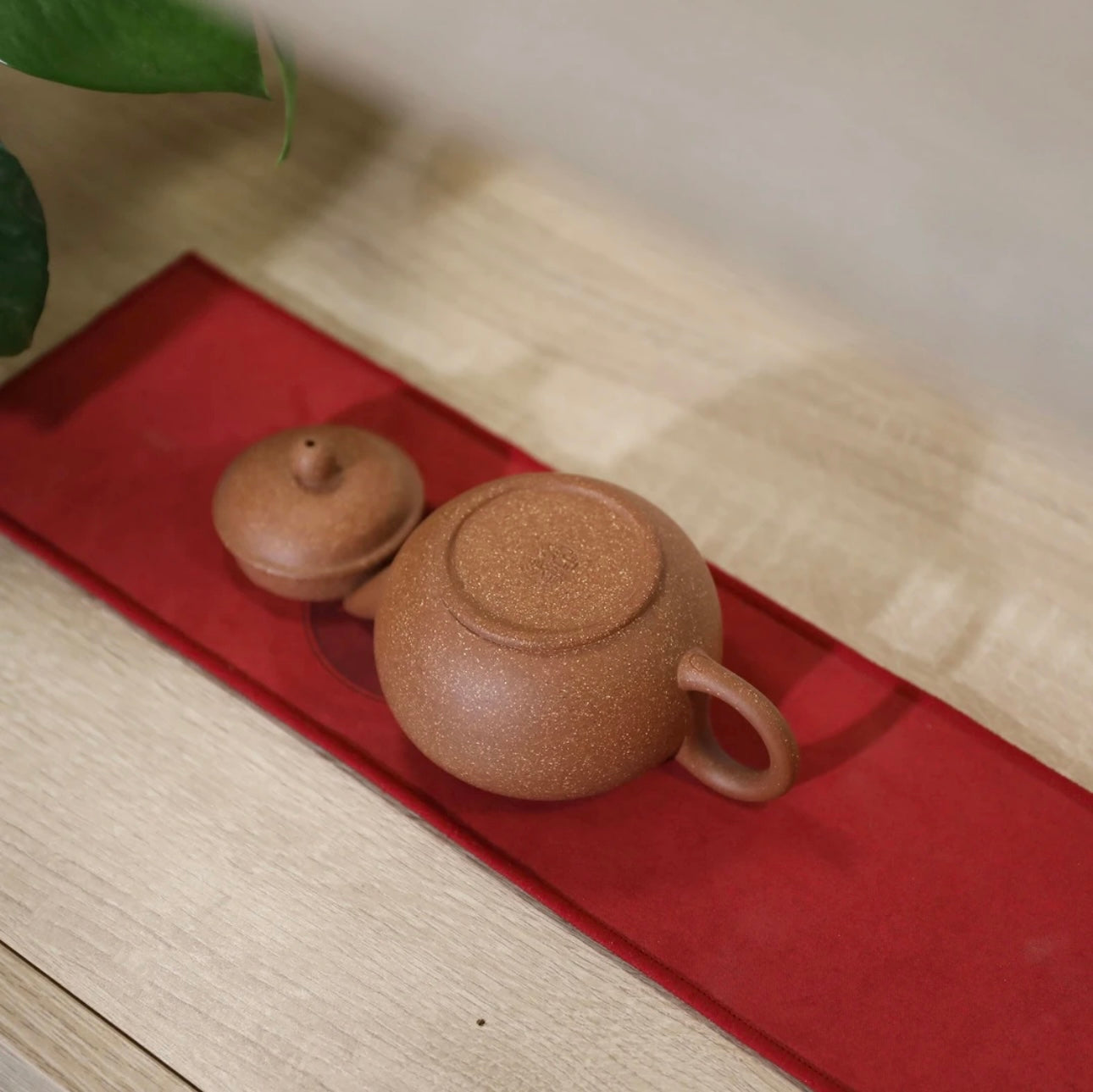Horizontal purple clay teapot