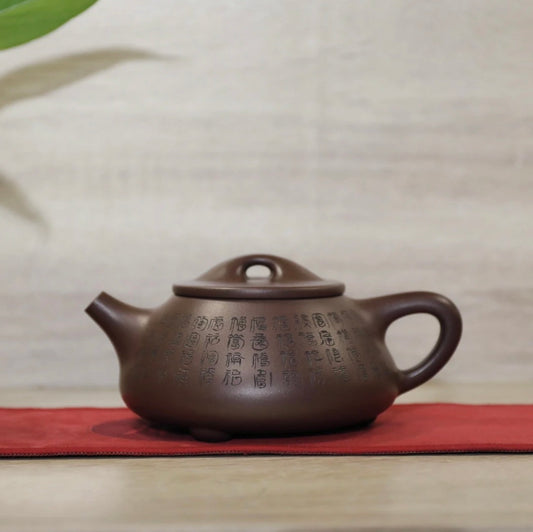 Purple clay teapot